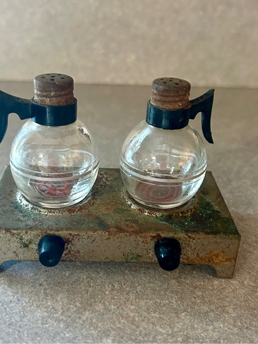Clear Glass coffee pot Salt and Pepper Shakers with Black stove Holder